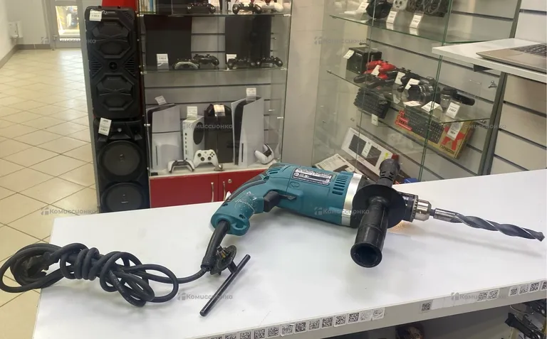 Ударная дрель Makita HP1630.