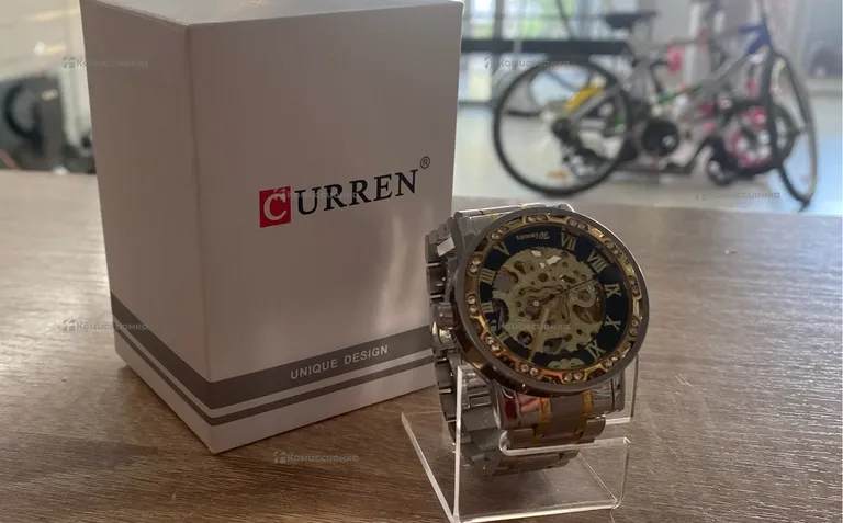 Часы  CUREN