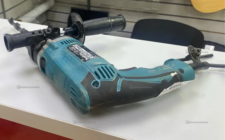 Ударная дрель Makita HP1630.