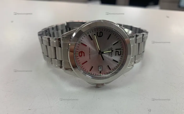 Часы  Casio MTP-1215