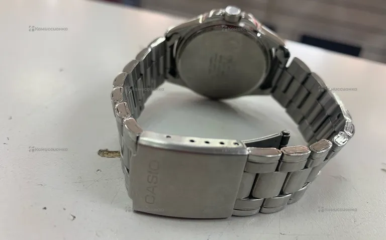 Часы  Casio MTP-1215