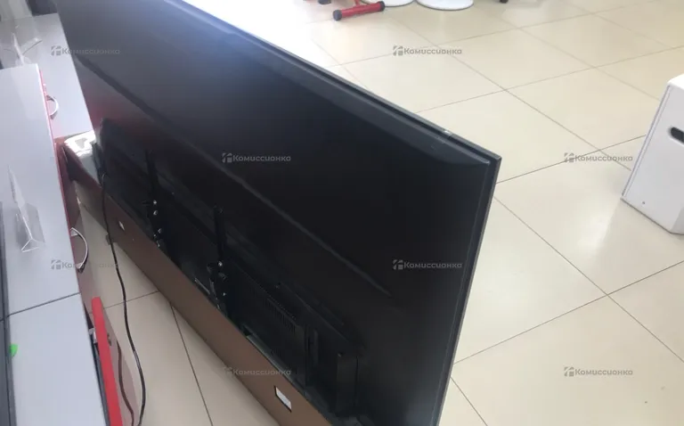 Телевизор DEXP 65UCY1/G