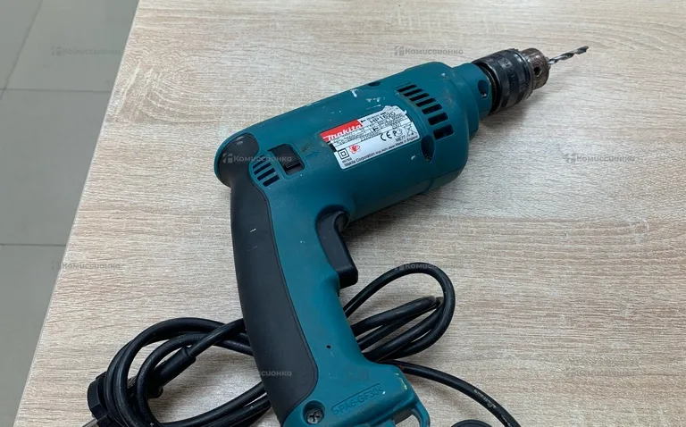 дрель ударная makita hp1620