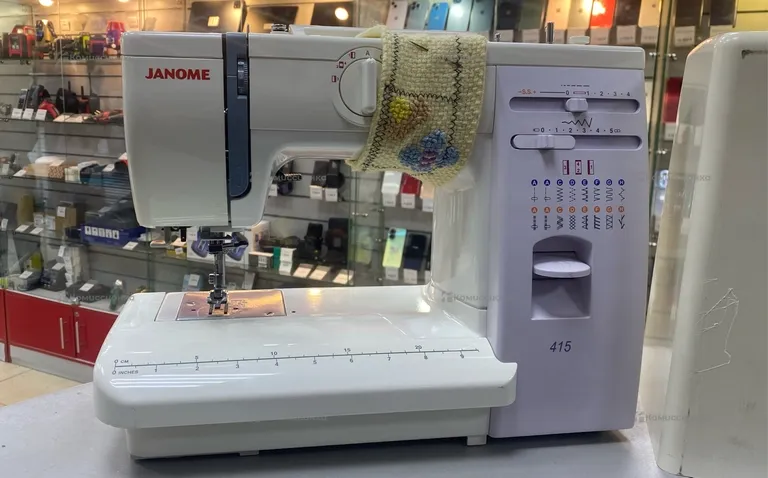 Швейная машина  Janome 415