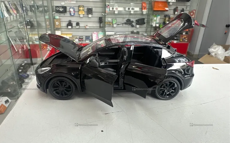 Машинка Tesla