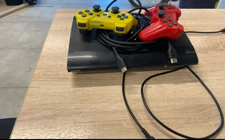 Приставка PS3.