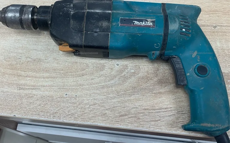Дрель Makita HP2031