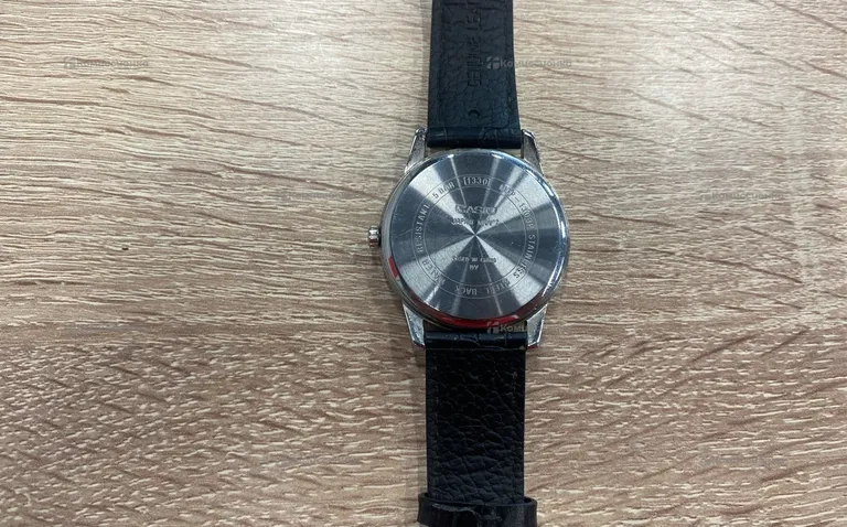 Часы  Casio 1303P