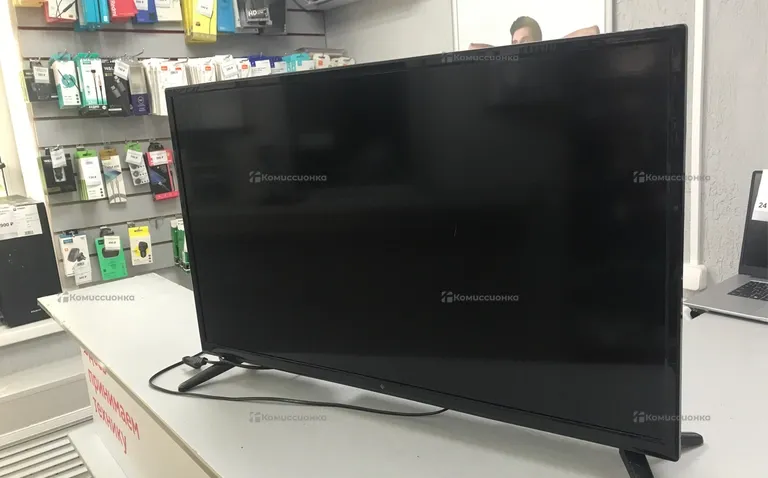 Телевизор DEXP12 H32F7000K