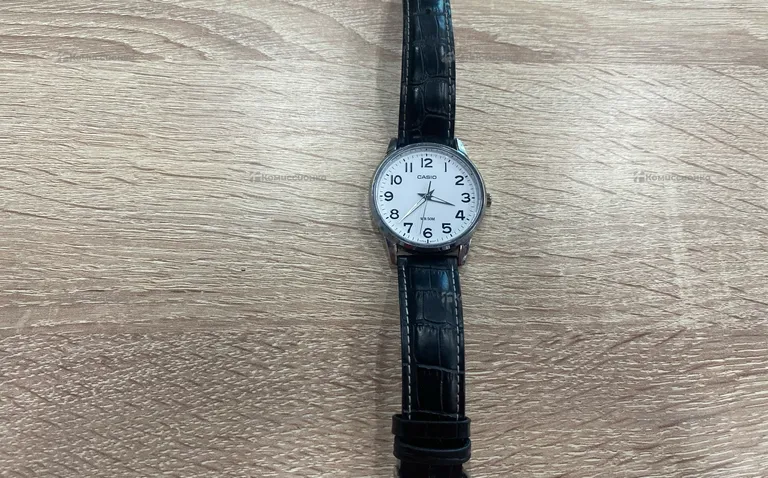 Часы  Casio 1303P