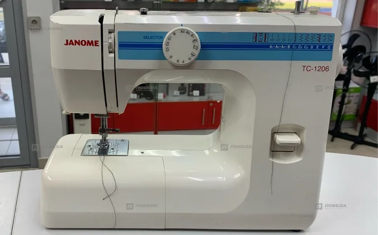 Швейная машина Janome TC 1206