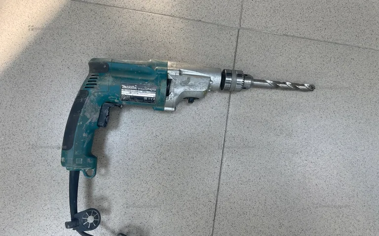 Дрель Makita DP4010