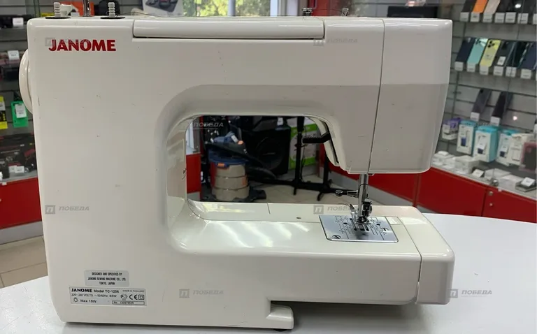 Швейная машина Janome TC 1206