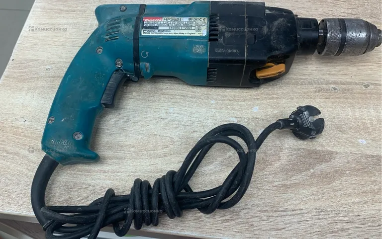 Дрель Makita HP2031