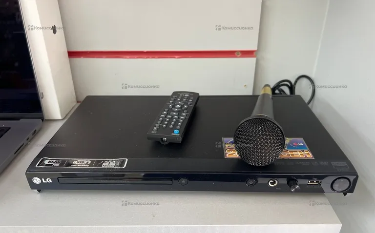 DVD проигрыватель LG DVX556K