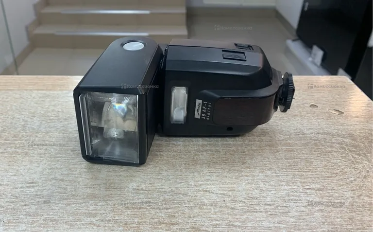Вспышка Metz 58 AF-1