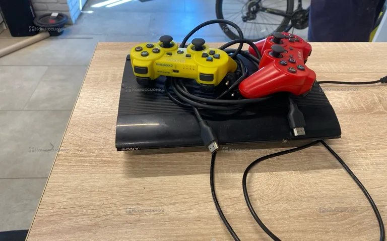 Приставка PS3.