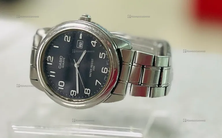 Часы Casio 1221